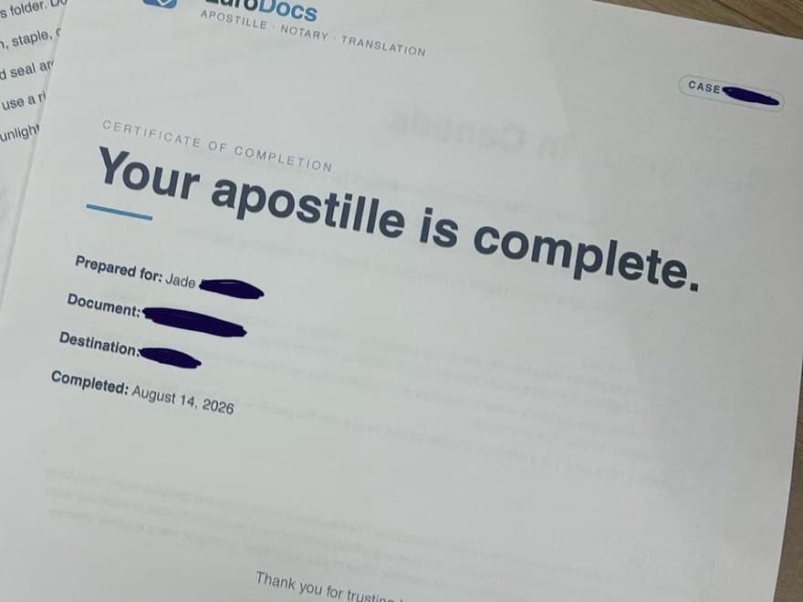 The LuroDocs certificate of completion and apostille care instructions, photographed by the reviewer.